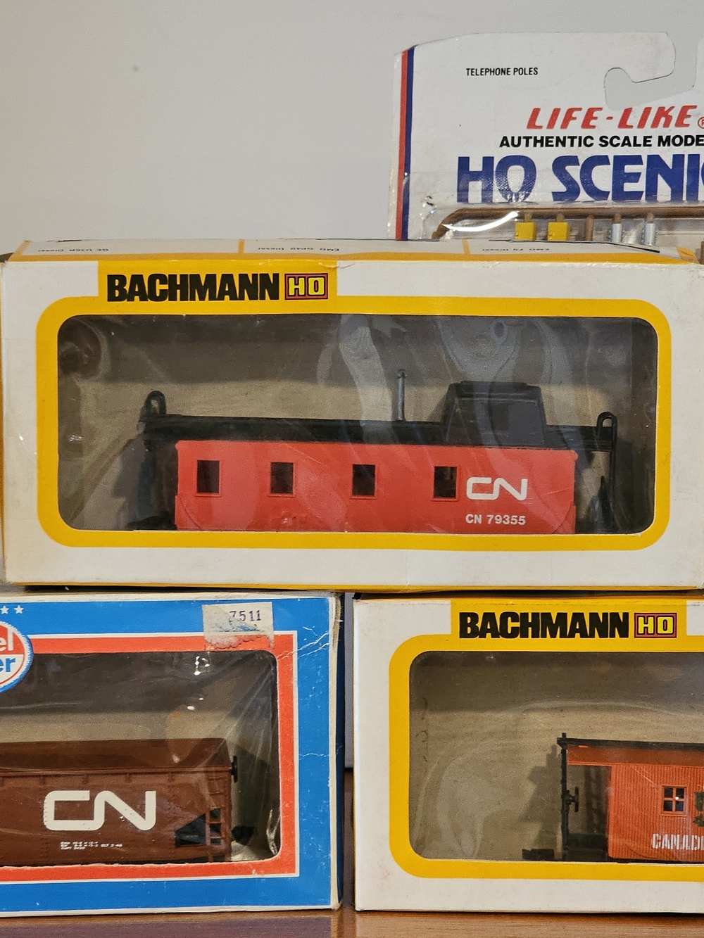 Assorted Model Train Cars and Accessories